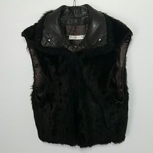 Real Opossum fur vest with 100% leather collar.